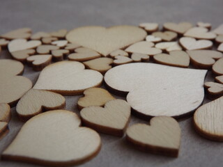 valentine's day greeting card-wooden hearts on a gray suede background