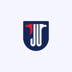Letters J and U with the heads of an eagle or a griffin on the shield. Concise logo with monogram JU or UJ. An emblem for fans of esports or an airsoft team.