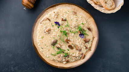 Italian lunch risotto with porcini mushrooms and herbs.