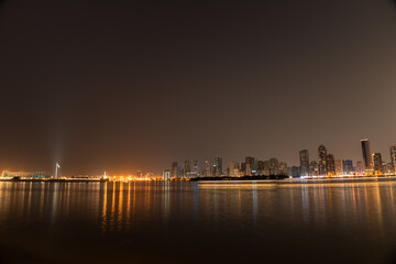 Fototapeta premium Sharjah urban cityscape skyline night scene