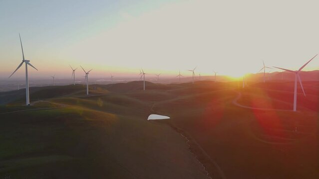 Aerial drone view of wind powers plant on greel hills near the Livermore, California