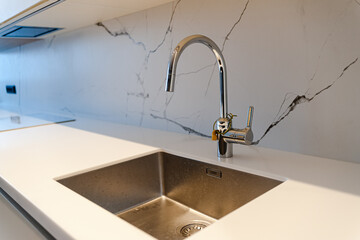kitchen sink with faucet