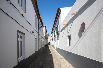 Fototapeta na wymiar A narrow street in Serpa city - Portugal