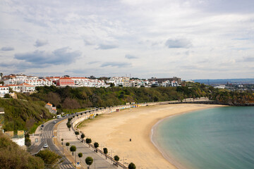 Fototapeta na wymiar Landscape of the empty Vasco da Gama beach in Sines - Portugal on a cloudy day