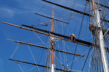 maritime scenery of an old large beautiful ship against the blue sky in London, England	