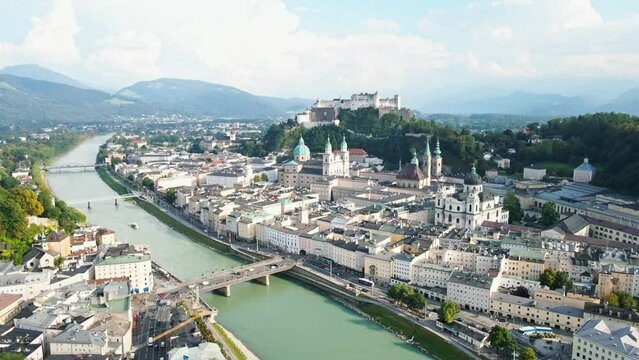 aerial drone panorama of Salzburg city in Austria. View of the historic city of Salzburg and Salzach river at summer.