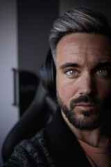 man with audio helmets