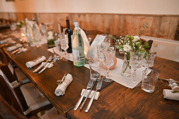Wedding table decoration. Wooden table.