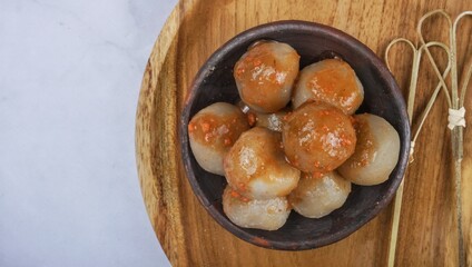 Indonesian Street Food Cilok, served in earthenware plate. Top View