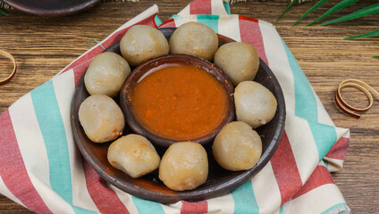 Indonesian Street Food Cilok, served in earthenware plate. Top View