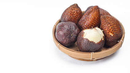 Salak or snake fruit in wicker bamboo. Salak is Indonesia's unique fruit