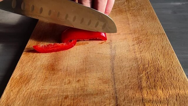 red chili pepper on chopping board