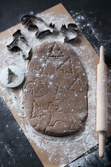 Dough for Christmas gingerbread. Animal cookie cutters.