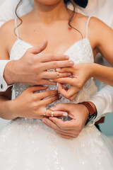Bride and groom holding in hands. Married couple rings weeding love hands.