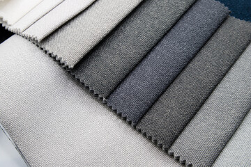 Bright collection of gunny textile samples. Set of fabric swatch samples texture. Samples of fabrics for furniture upholstery.