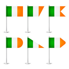 Realistic various Iriah table flags on a chrome steel pole. Souvenir from Ireland. Desk flag made of paper or fabric, shiny metal stand. Mockup for promotion and advertising. Vector illustration