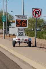 mobile speed limit sign on a trailer with speed detector and your speed electronic readout on the...
