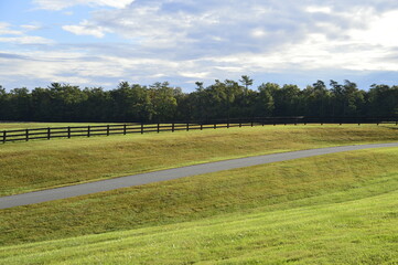 Empty, rural horse paddock with wooden fence in the Virginia countryside
