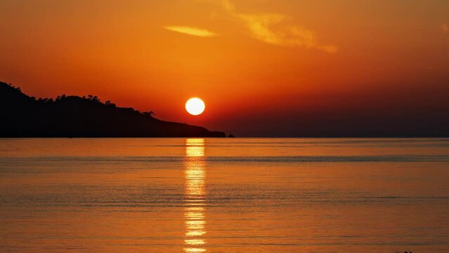 Beautiful sunset with mountains in Fethiye in Turkey. 4k time lapse video footage UHD 3840x2160