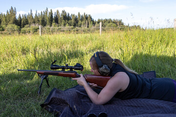 woman target shooting 