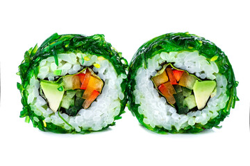 Fresh sushi rolls with avocado, cucumber, sweet pepper and seaweed.