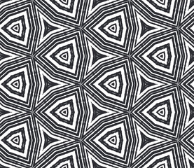 Ikat repeating swimwear design. Black