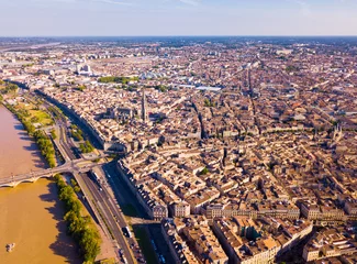 Fotobehang Day aerial cityscape of Bordeaux city and Garonne river in France © JackF