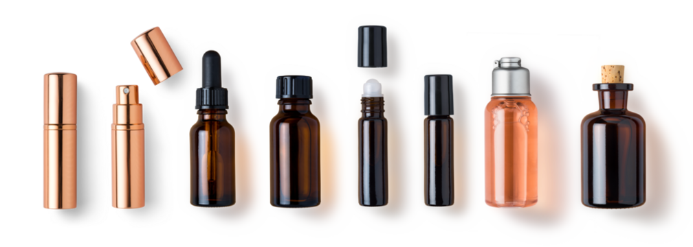 various bottles / roller bottles / spray bottles made of glass and metal for cosmetics, natural medicine , essential oils or other liquids isolated over a transparent background, top view