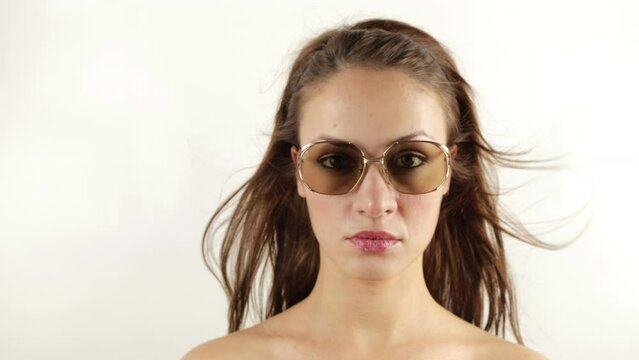 woman with different vintage sunglasses