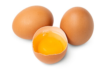 Egg. Brown eggs. Half an egg with yellow yolk. Organic raw non boiled chicken eggs. Brown eggshell. Farm bird product. Good for breakfast, cooking recipe. Food photography. isolated background.