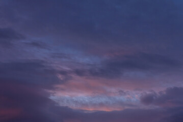 sky with clouds at sunset and sweet hour with pastel shades of the blue and red range