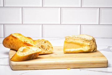Bread and Cheese on a Cutting Board 1