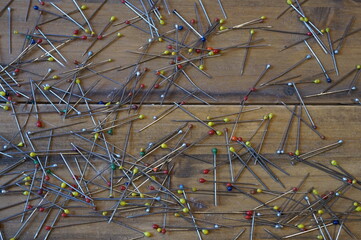 Straight Pins with Colored Tops on Wood Panels