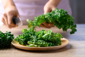 Green Kale or leaf cabbage prepare for cooking, Healthy organic vegetable food ingredient