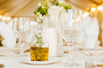 Table Set for a Wedding Celebration with Olive Oil and Wine