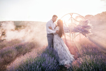 Gorgeous wedding couple. Wedding on a lavender field.