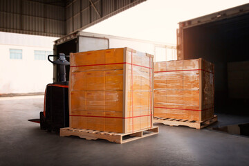 Package Boxes Wrapped Plastic Stacked on Pallets Loading into Cargo Container. Loading Dock Distribution Supplies Warehouse. Shipping Supply Chain Shipment. Freight Truck Logistics Cargo Transport	