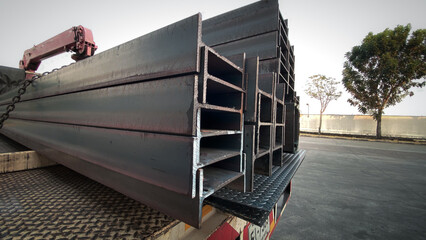 Steel beams production. Metal girders stack on project construction , steel h-beam, selective...
