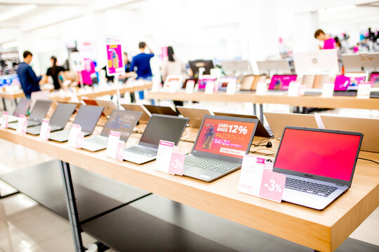 Laptops and tablets on the counter in an electronics store. Electrical household appliances. Sale of goods on black friday in the mall. Almaty, Kazakhstan - January 15, 2023