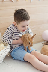 Child with bunny and Easter decor