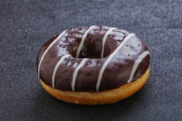 Glazed sweet tasty chocolate donut