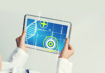 Close of female doctor hands working with tablet pc computer
