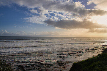 Obraz premium Big winter storm creates huge waves at sunset on the Santa Barbara Mesa