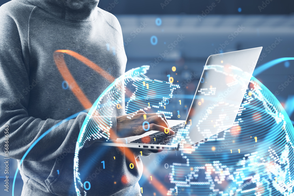 Poster hands using laptop with abstract globe sphere hologram with coding and polygonal network on blurry office interior background. Future, technology and digital world concept. Double exposure.