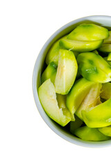 Fresh Elaeocarpus hygrophilus fruit heap and cut in half in white cup isolated on white background
