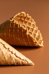 Close-up of waffle cones, creative macro concept of sweets and food.