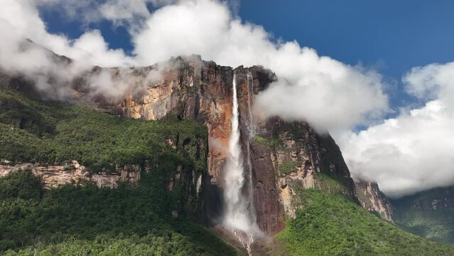 Camera moving away from Angel Falls in sunlight in Canaima National Park, Venezuela.