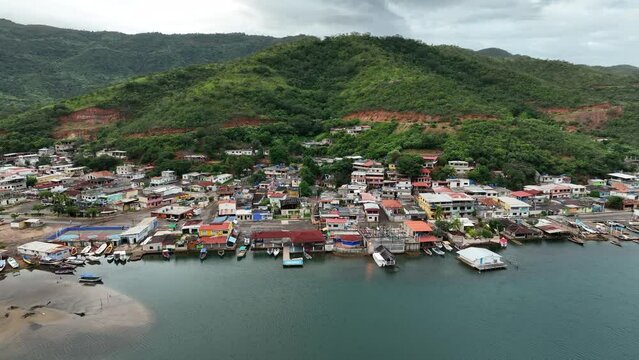 Camera moving away from small Venezuelan town of Mochima in Mochima National Park, Venezuela.