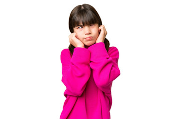 Little caucasian girl over isolated background frustrated and covering ears