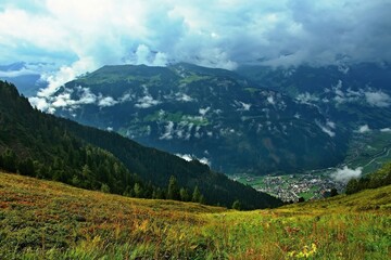 Obraz premium Austrian Alps - view of Mayrhofen in the Zillertal valley from the footpath at the upper station of the Ahornbahn cable car